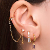 Stud earring with gold ear cuff