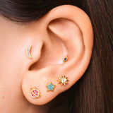 Galaxy earrings set in gold