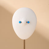 Piercing capezzoli sfera blu opale in argento