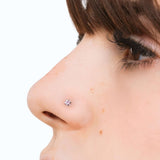 Pink star nose piercing in silver