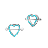 Silver heart nipple piercings with blue crystals
