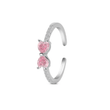 Bright pink bow ring in silver