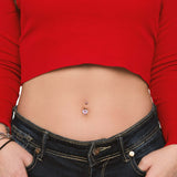 Silver heart navel piercing with pink crystals