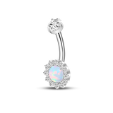 Silver navel piercing with turquoise crystal
