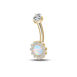 Gold navel piercing with turquoise crystal