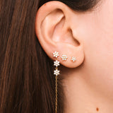 White bouquet earrings in gold