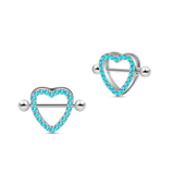 Silver heart nipple piercings with blue crystals