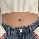 Silver crystal navel piercing