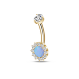 Gold navel piercing with turquoise crystal