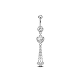 Navel piercing with heart and silver pendants