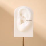 Orecchino ear cuff zig zag bianco in argento - NovaNavel