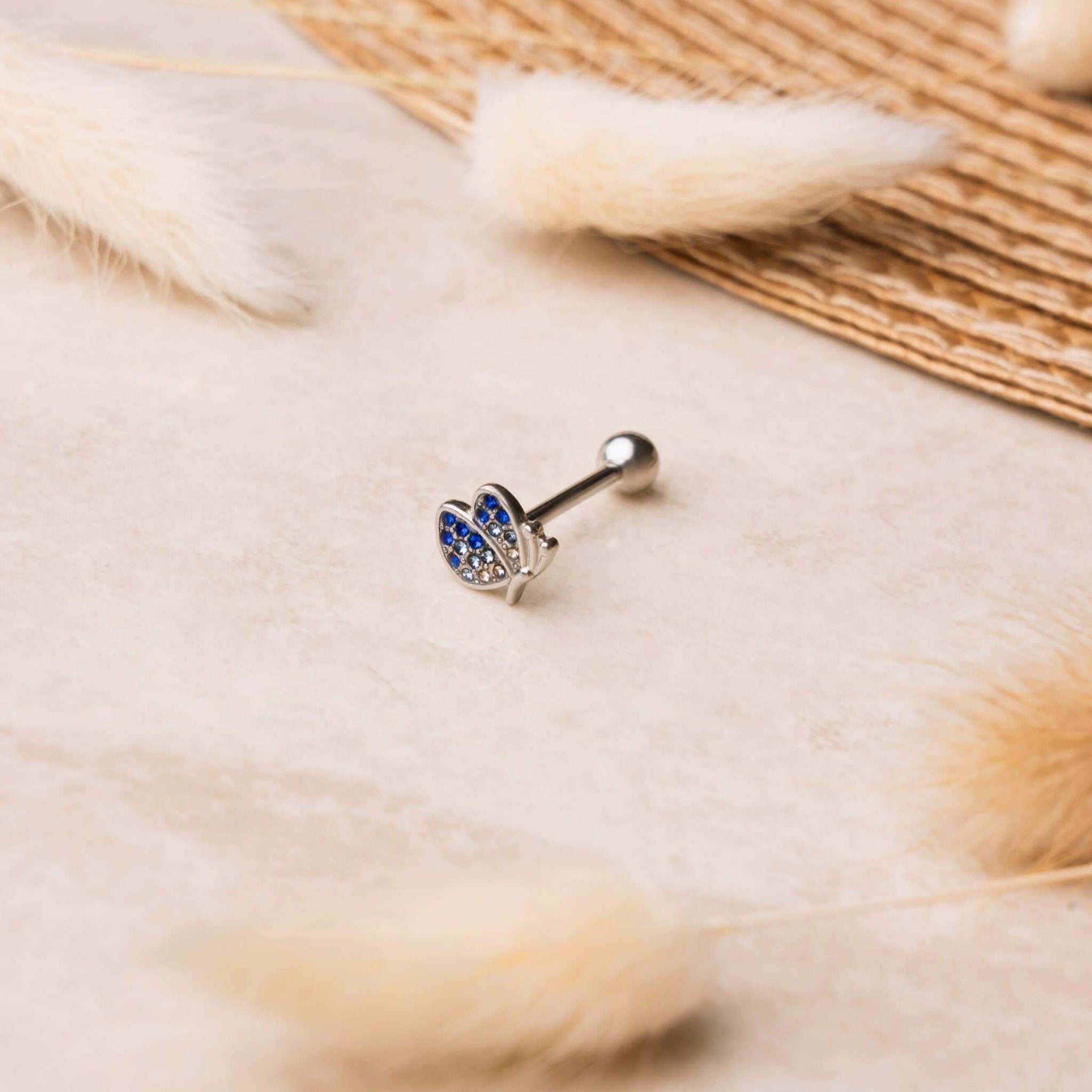 Piercing lingua farfalla in argento con ali azzurre - NovaNavel