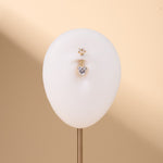 Piercing ombelico amore fiorito bianco in oro - NovaNavel®