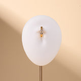 Piercing ombelico cerchietto con margherita bianco in oro - NovaNavel®