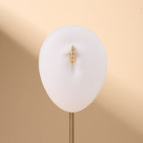 Piercing ombelico cerchietto con punto luce bianco in oro - NovaNavel®
