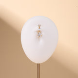 Piercing ombelico con doppia stella bianca in oro - NovaNavel®
