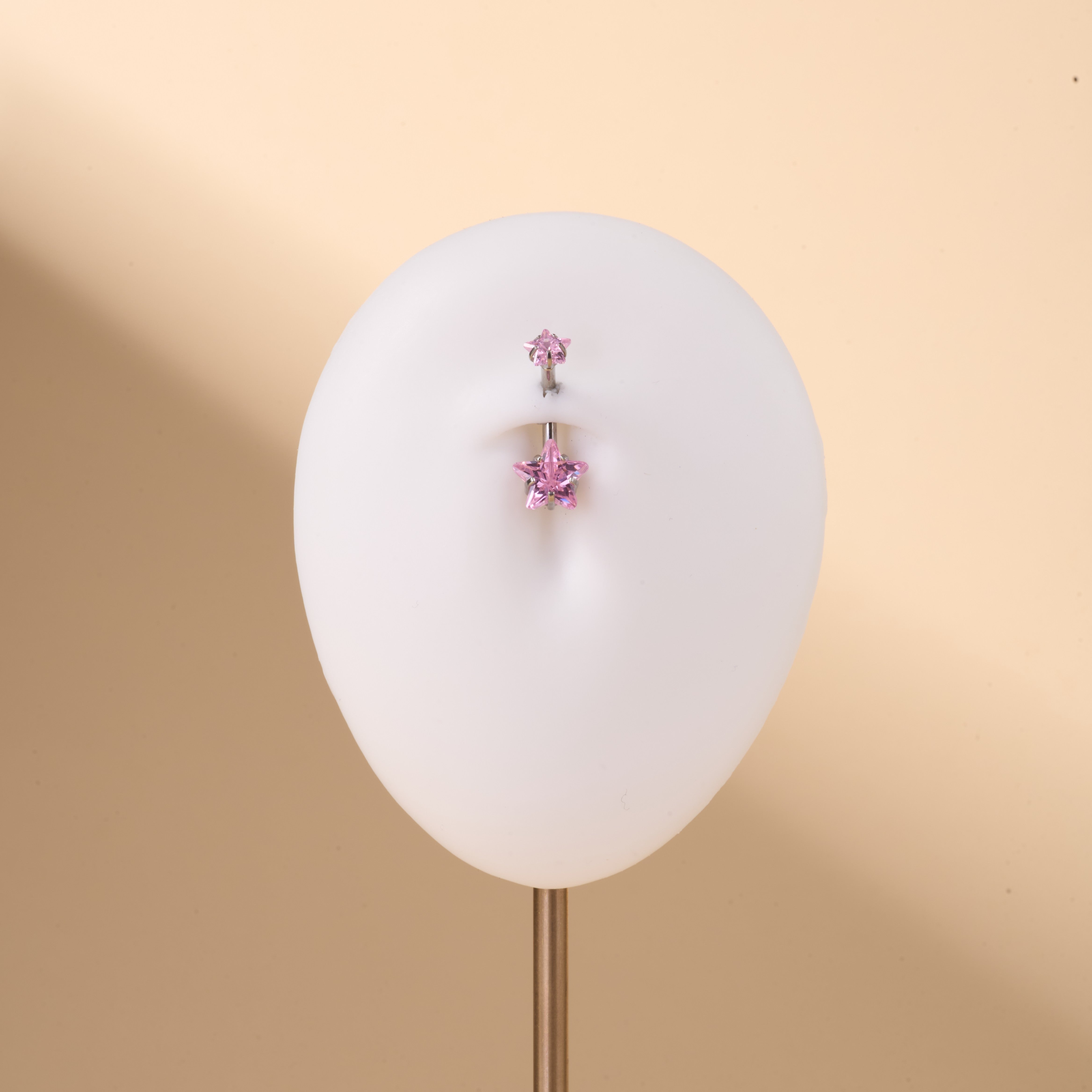 Piercing ombelico con doppia stella rosa in argento - NovaNavel®