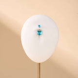 Piercing ombelico con doppio cuore azzurro in argento - NovaNavel