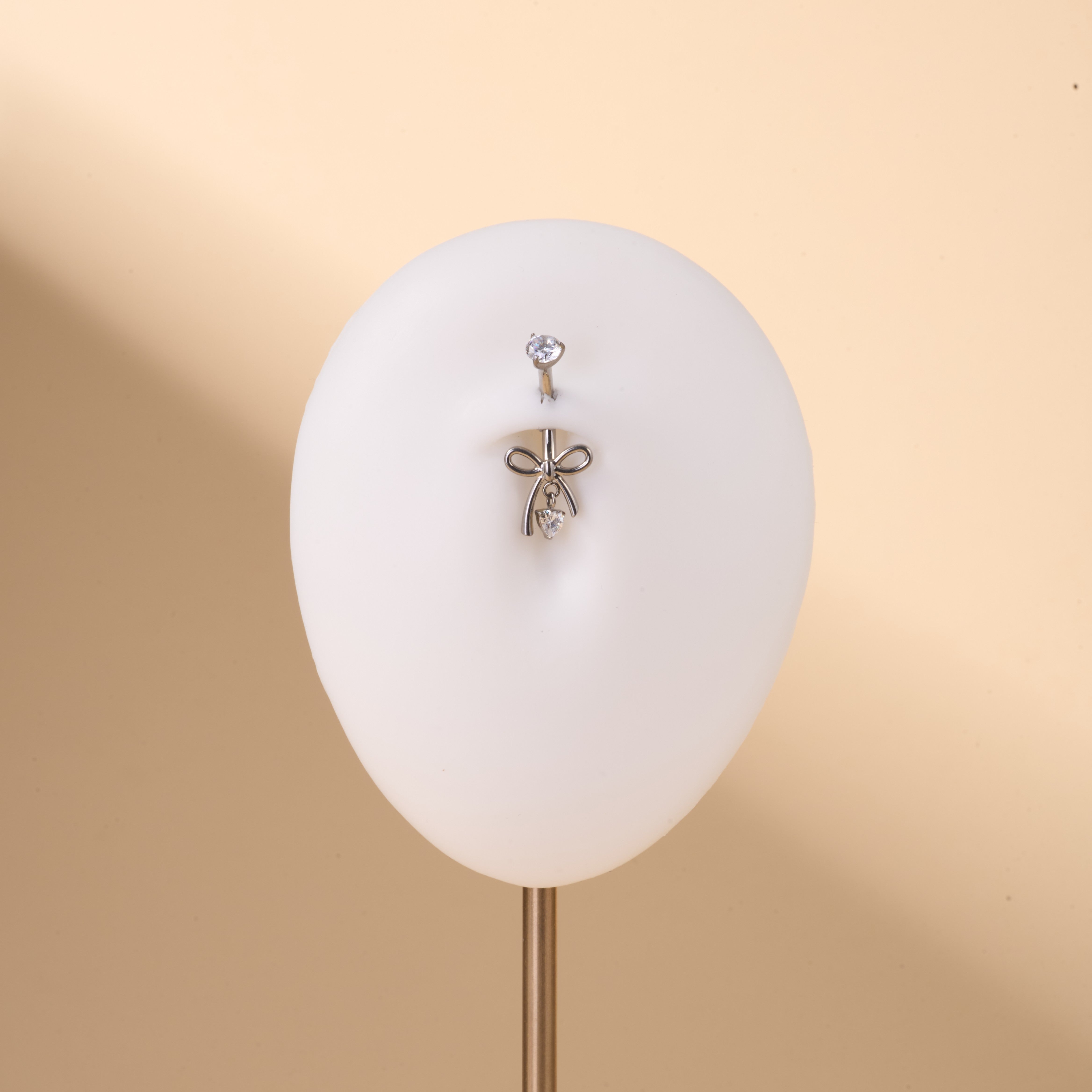 Piercing ombelico fiocco luxury bianco in argento - NovaNavel®