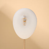 Piercing ombelico floating four points bianco in oro - NovaNavel