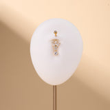 Piercing ombelico piccolo fiore luminoso bianco in oro - NovaNavel®